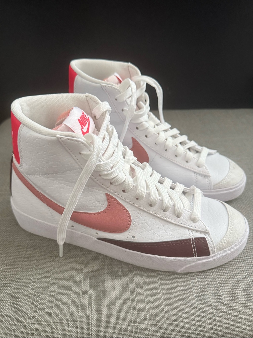 Nike Women’s White High-Top Sneakers with Pink Swoosh